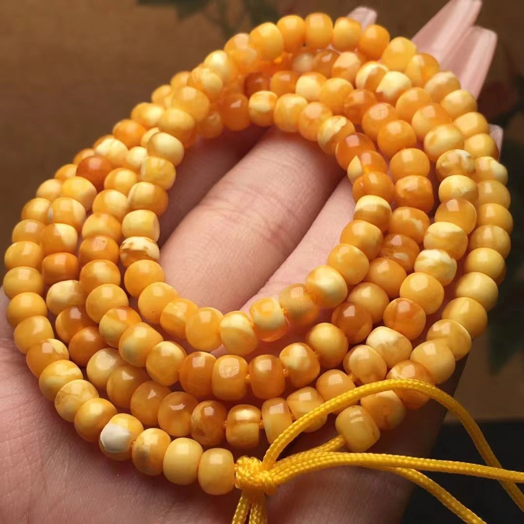 Collar y pulsera de varias vueltas con cuentas de Buda hechas de cera de abejas natural