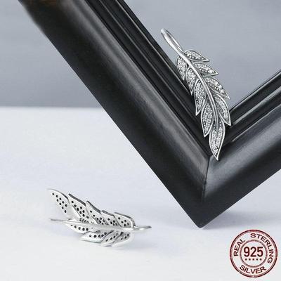 Mika - Boucles d'oreilles en argent sterling avec ailes en plumes pour femmes végétaliennes