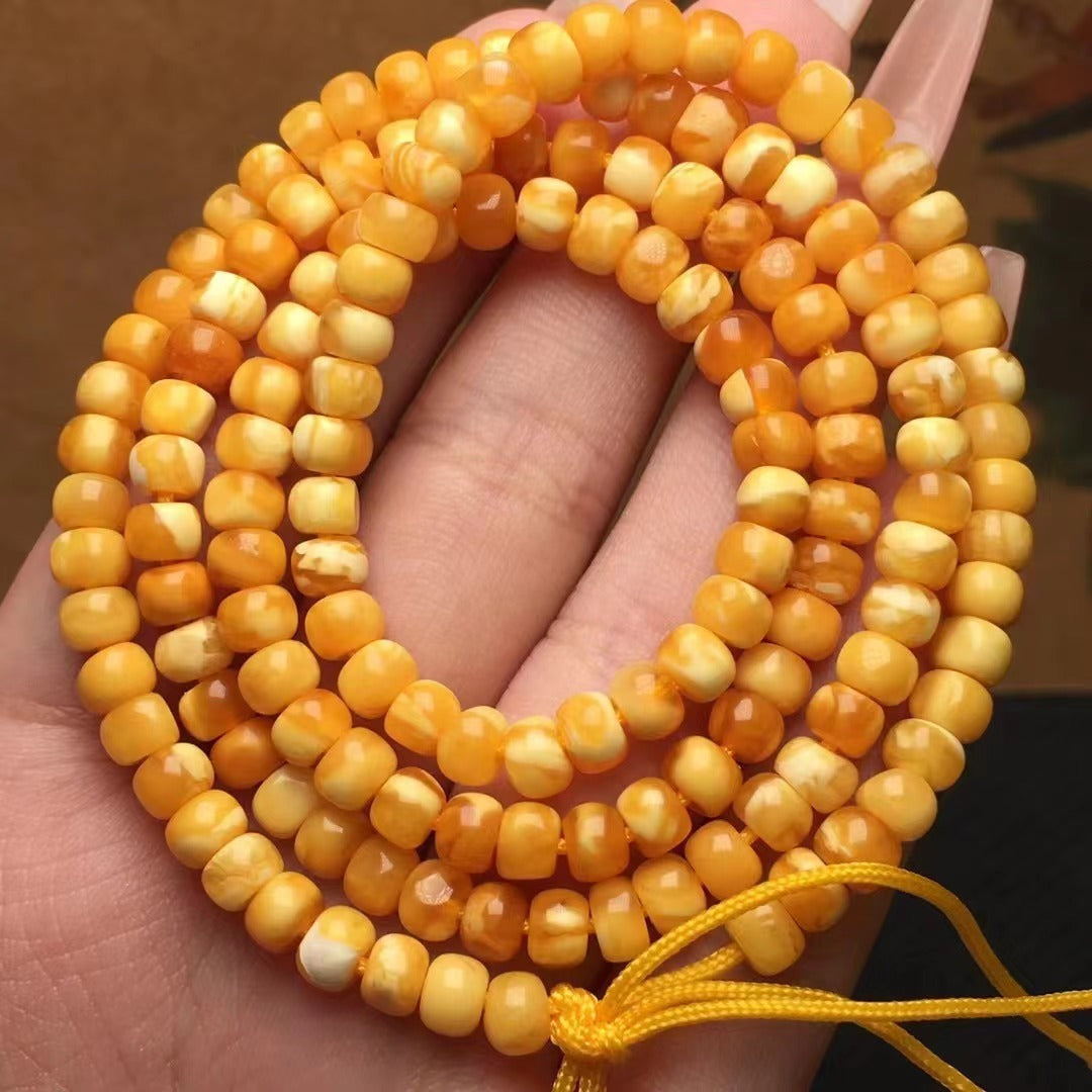 Collar y pulsera de varias vueltas con cuentas de Buda hechas de cera de abejas natural