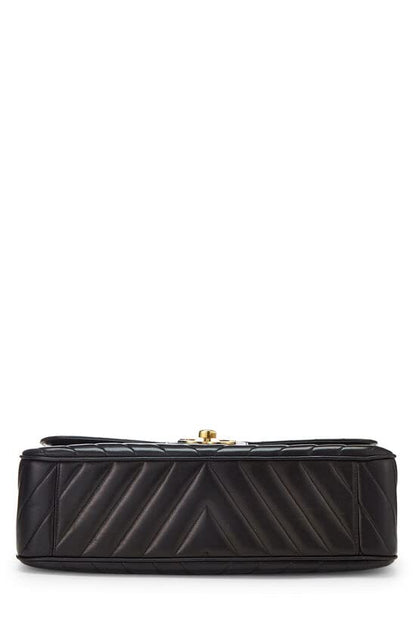 CHANEL, Pre-Loved Black Chevron Lambskin Half Flap Maxi, Black