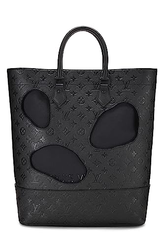 Louis Vuitton, Sac Empreinte monogramme noir avec trous COMME DES GARÇONS x Louis Vuitton pré-aimé, Noir