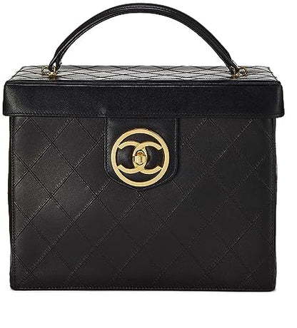 Chanel, trousse de toilette ronde « CC » en cuir d'agneau noir d'occasion, grande taille, noir