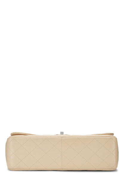 Chanel, Caviar acolchado beige Pre-Loved New Classic Jumbo con doble solapa, Beige