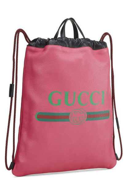 Gucci, sac à dos à cordon de serrage en cuir rose avec logo imprimé, grand modèle, rose