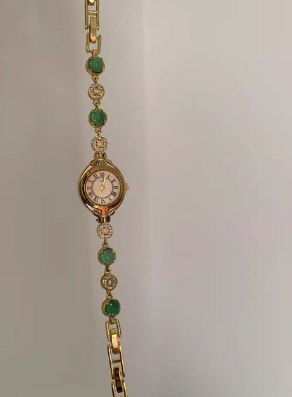 Reloj de cuarzo con diseño de interés especial en color esmeralda