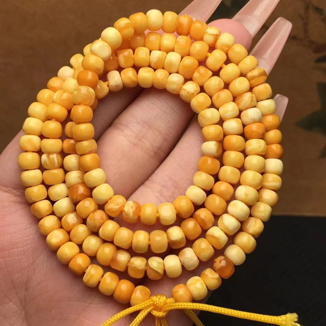 Collar y pulsera de varias vueltas con cuentas de Buda hechas de cera de abejas natural