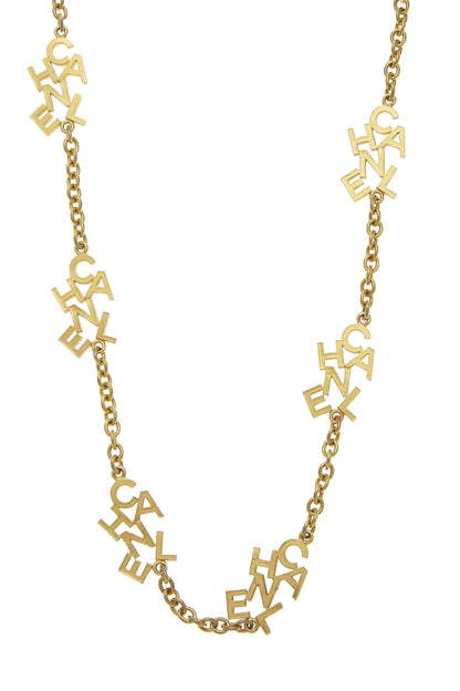 Chanel, Collier à breloques avec lettres et logo doré d'occasion, or