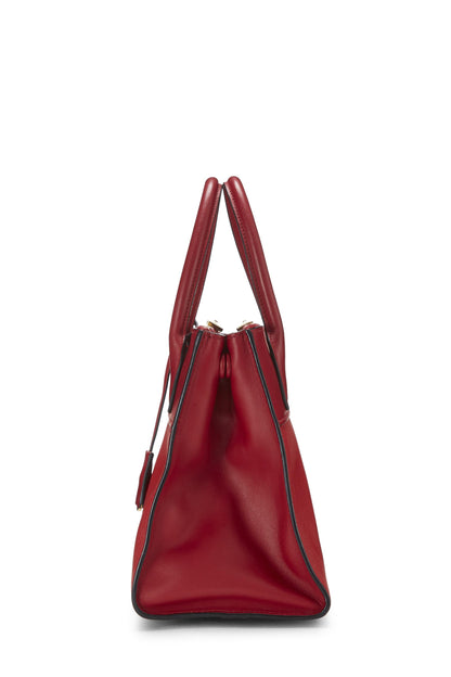 Prada, sac à bandoulière Paradigme City en cuir Saffiano rouge d'occasion, taille moyenne, rouge