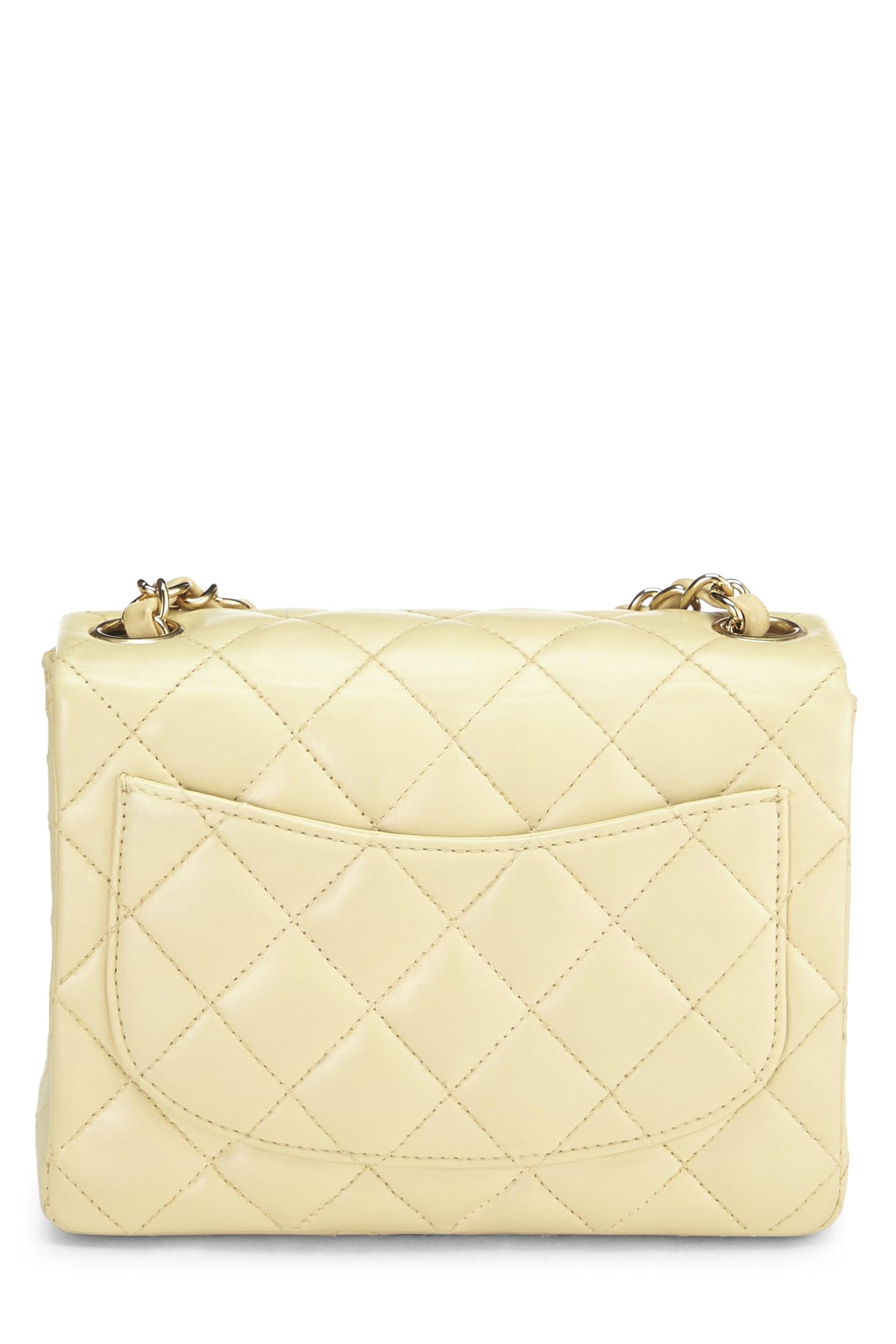 Chanel, Mini sac à rabat en cuir d'agneau matelassé beige d'occasion, beige