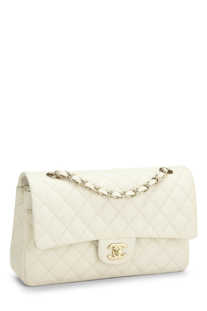 Chanel, sac à main matelassé à double rabat classique Caviar blanc d'occasion, taille M, blanc