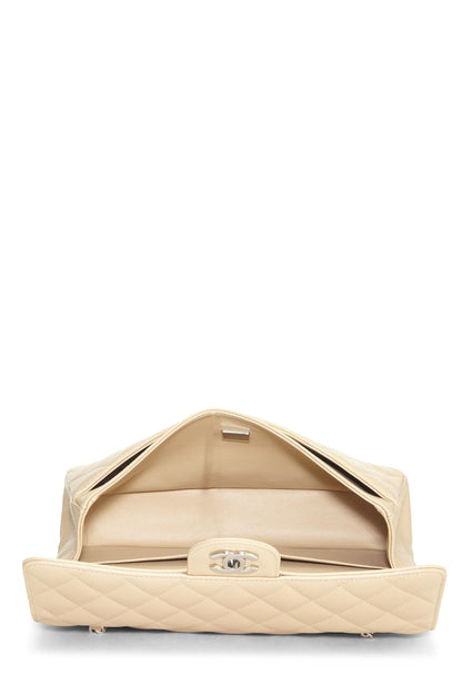 Chanel, sac à rabat double classique matelassé beige caviar d'occasion, taille M, beige