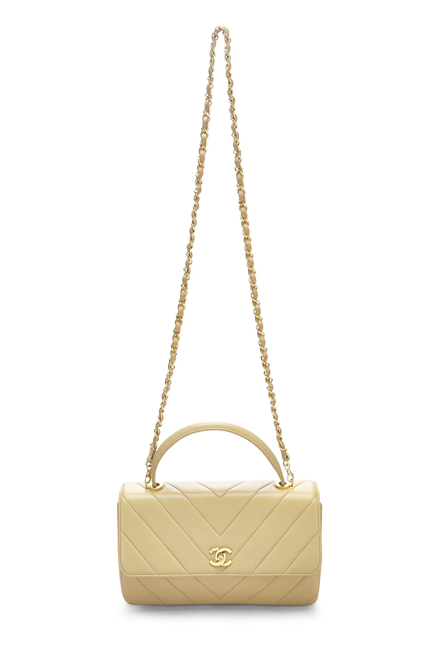 Chanel, sac à main en cuir d'agneau beige à chevrons d'occasion, beige