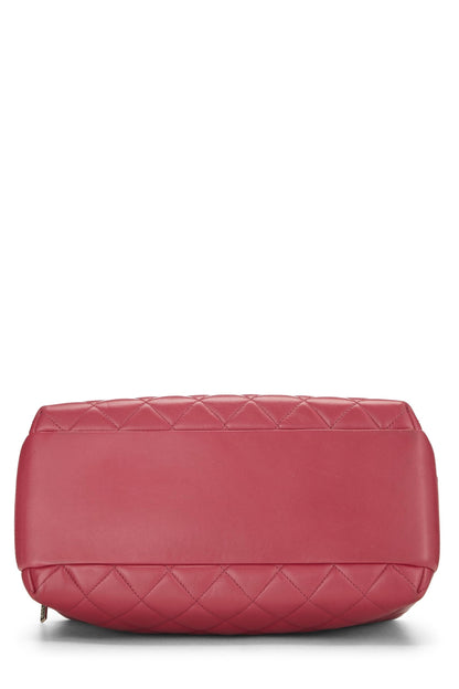 Chanel, sac bowling tendance « CC » en cuir d'agneau matelassé rose, grand modèle, d'occasion, rose