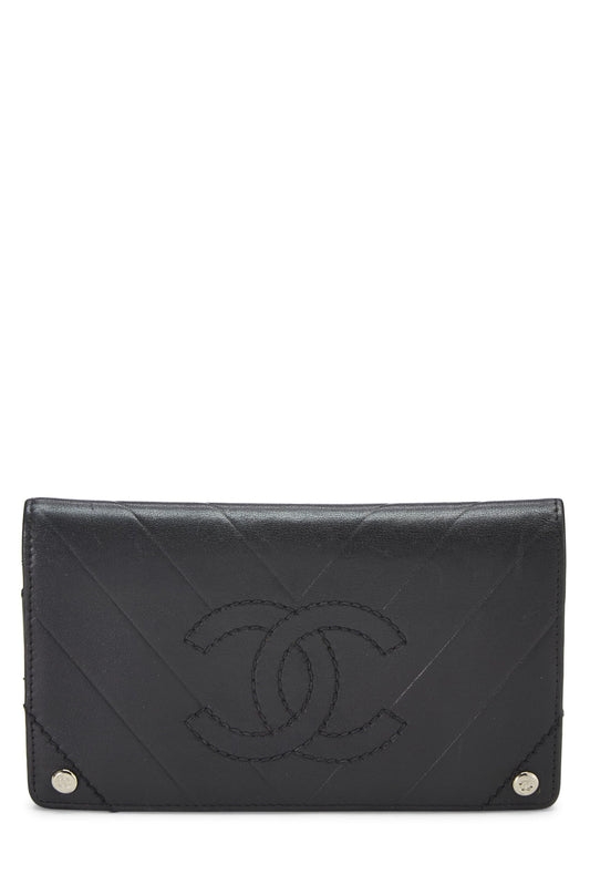 Chanel, Cartera de piel de becerro con chevron negra Pre-Loved, Negro