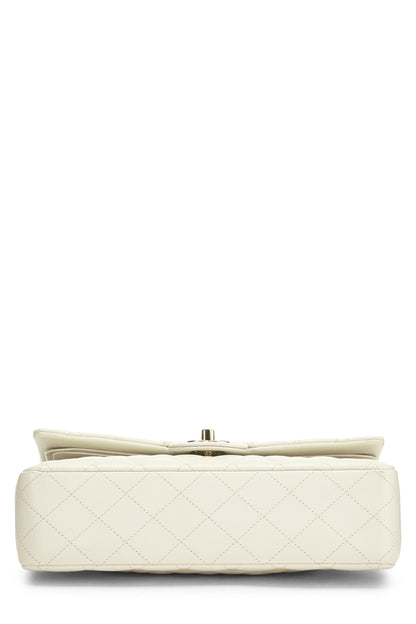 Chanel, sac à main matelassé à double rabat classique Caviar blanc d'occasion, taille M, blanc