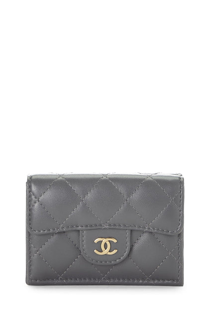 Chanel, portefeuille compact « CC » en cuir de veau matelassé gris d'occasion, gris