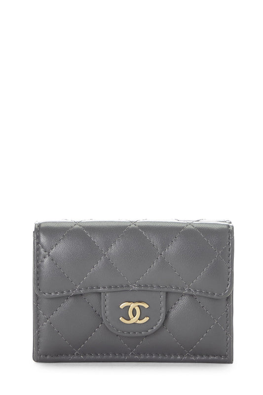 Chanel, portefeuille compact « CC » en cuir de veau matelassé gris d'occasion, gris