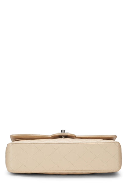 Chanel, sac à rabat double classique matelassé beige caviar d'occasion, taille M, beige