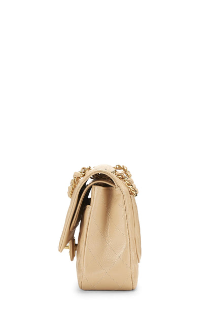 Chanel, sac à rabat double classique matelassé beige caviar d'occasion, taille M, beige