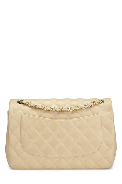 Chanel, sac à main jumbo à double rabat en cuir d'agneau matelassé beige d'occasion, beige