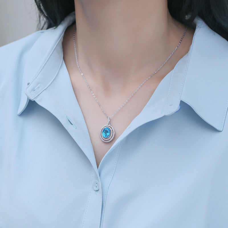 Collier en argent sterling S925 de luxe léger haute définition avec cœur océanique et topaze bleue incrustée de bijoux en moissanite