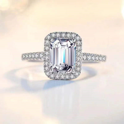 Emerald Cutter Proposes And Engages Moissanite Diamond Ring