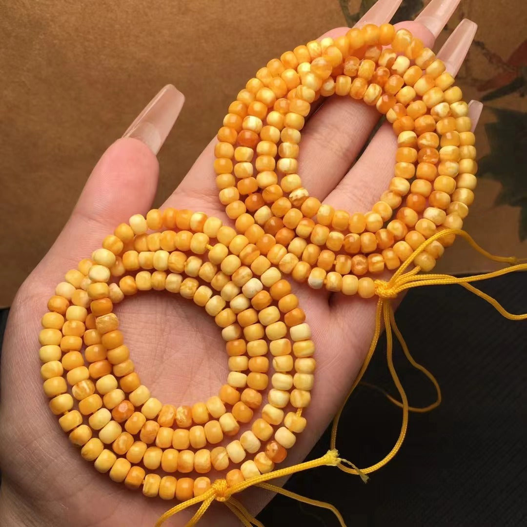 Collar y pulsera de varias vueltas con cuentas de Buda hechas de cera de abejas natural