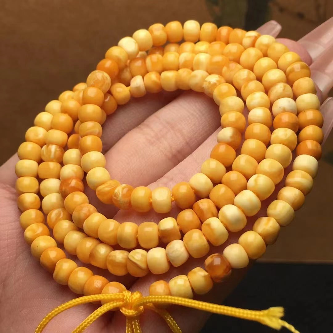 Collar y pulsera de varias vueltas con cuentas de Buda hechas de cera de abejas natural