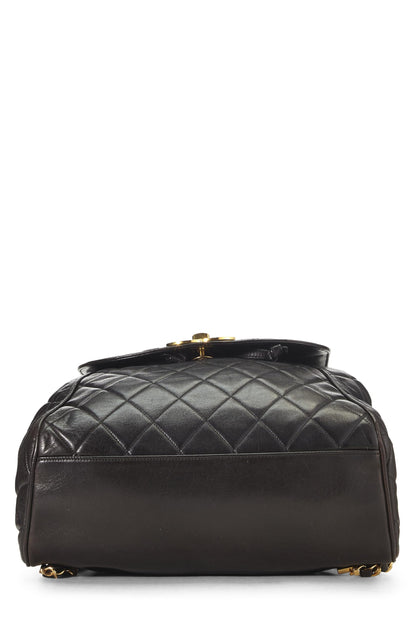 Chanel, sac à dos matelassé en cuir d'agneau noir d'occasion, grand modèle, noir