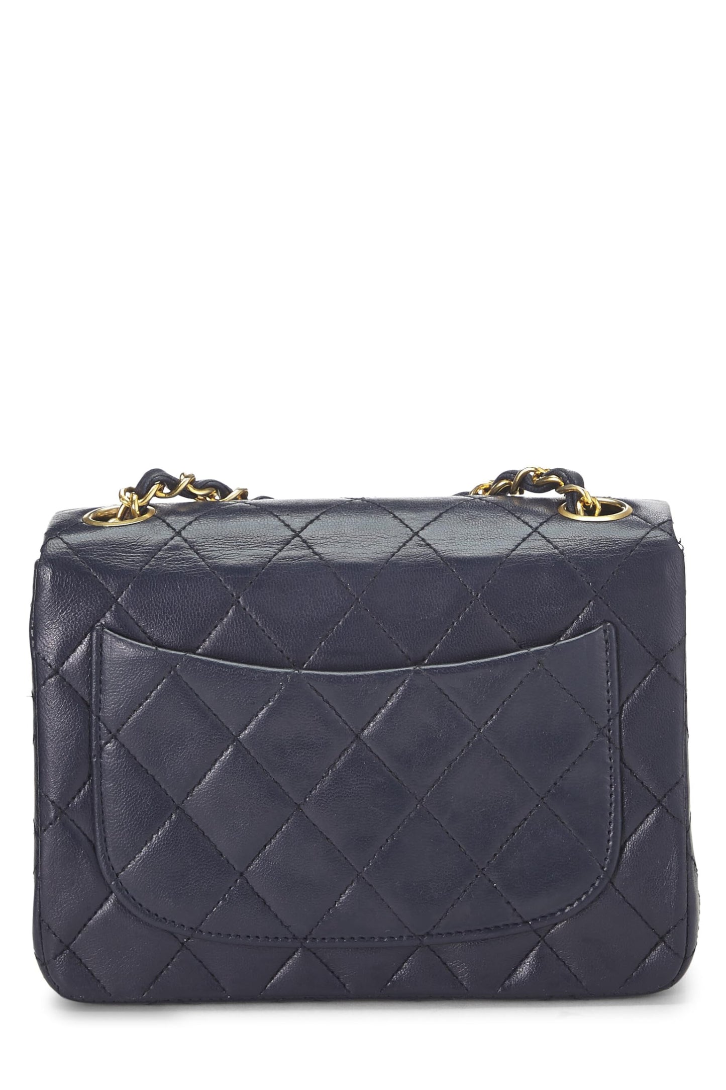 Chanel, Mini sac à rabat en cuir d'agneau matelassé bleu marine d'occasion, bleu marine