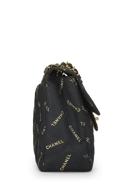 Chanel, Maxi sac à rabat demi-corps en toile noire avec logo d'occasion, noir