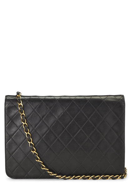 Chanel, sac à rabat matelassé en cuir d'agneau noir de taille moyenne, d'occasion, noir