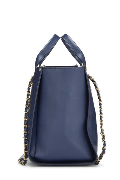 Chanel, sac cabas Deauville clouté bleu caviar de taille moyenne, d'occasion