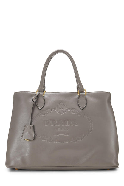 Prada, Bolso tote mediano con broche lateral y logotipo de piel de becerro gris Pre-Loved, Gris