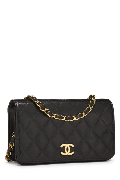 Chanel, Mini sac à rabat à pression en cuir d'agneau matelassé noir d'occasion, noir