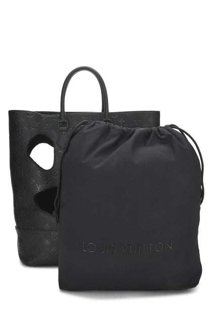 Louis Vuitton, Sac Empreinte monogramme noir avec trous COMME DES GARÇONS x Louis Vuitton pré-aimé, Noir