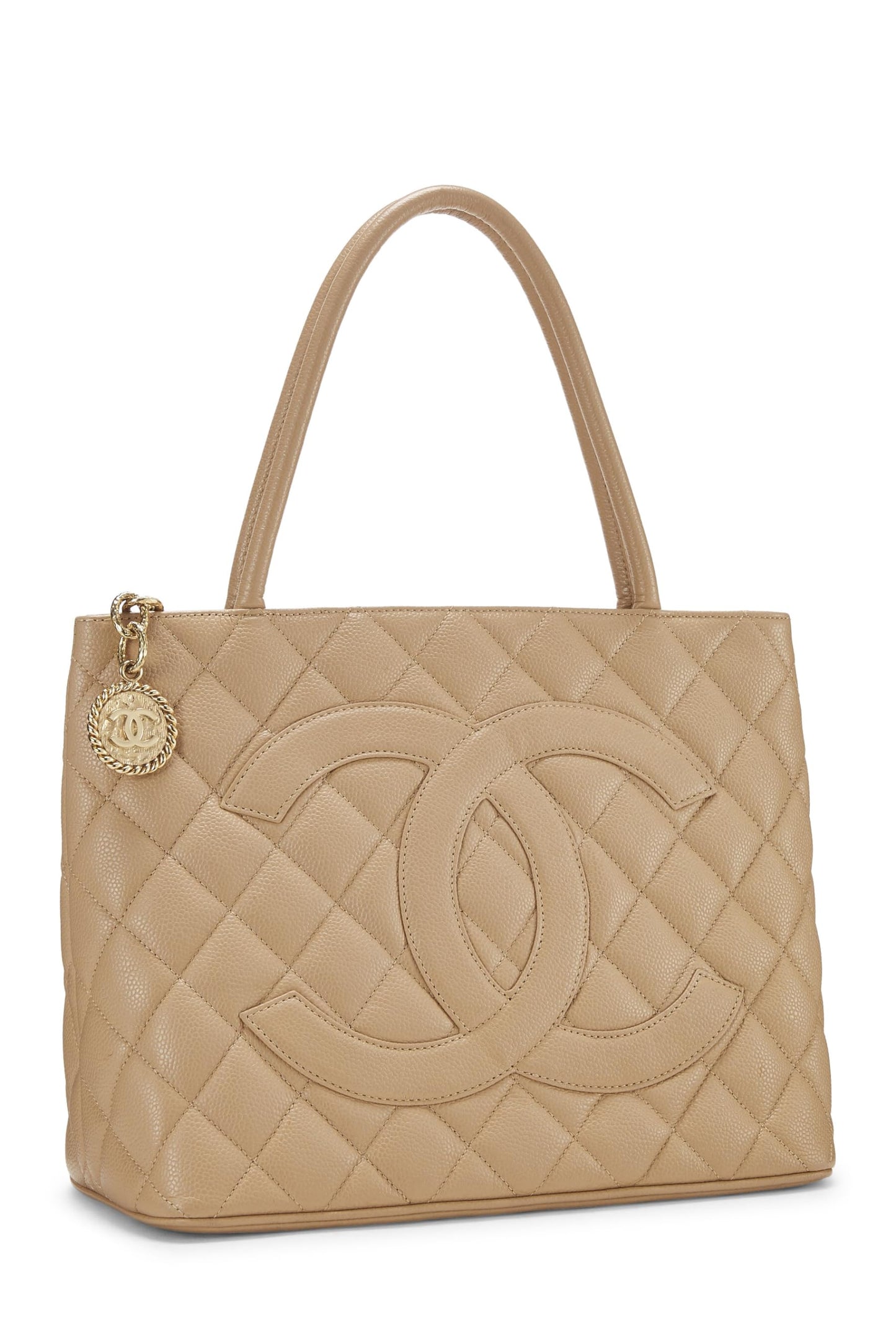 Chanel, sac fourre-tout matelassé à médaillon en caviar beige d'occasion, beige