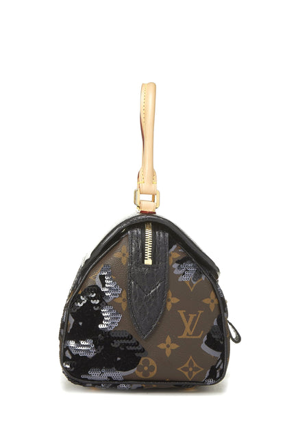 Louis Vuitton, Bolso carrusel Fleur De Jais de lona con monograma Pre-Loved, Marrón