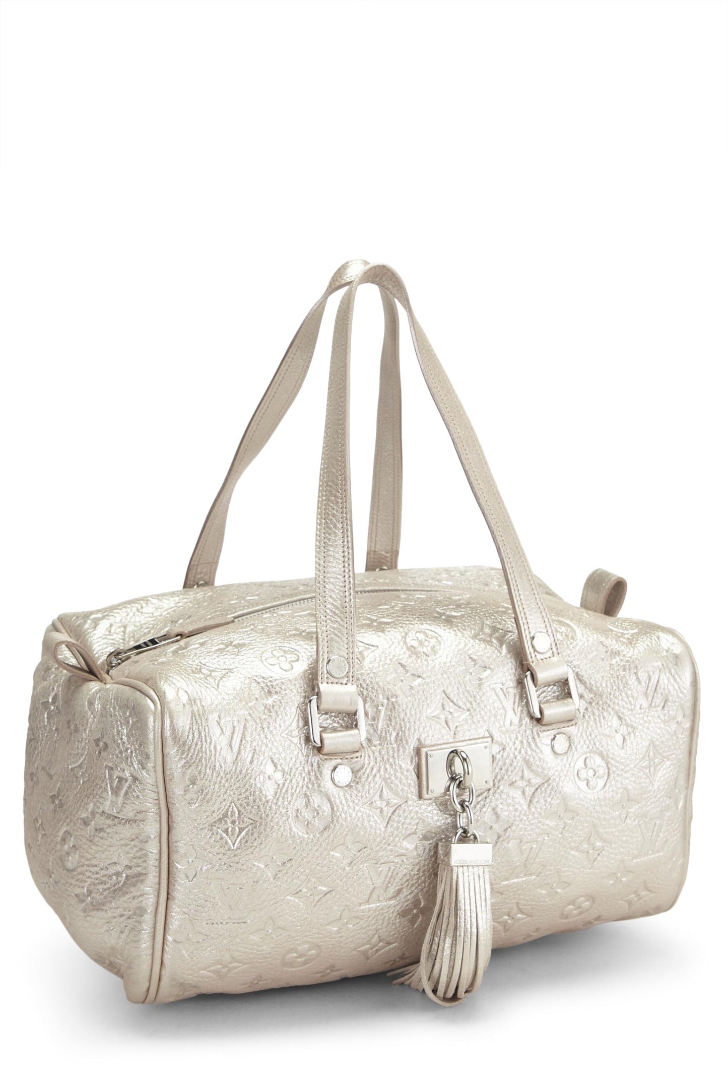 Louis Vuitton, Cometa brillante con monograma plateado Pre-Loved, Plata