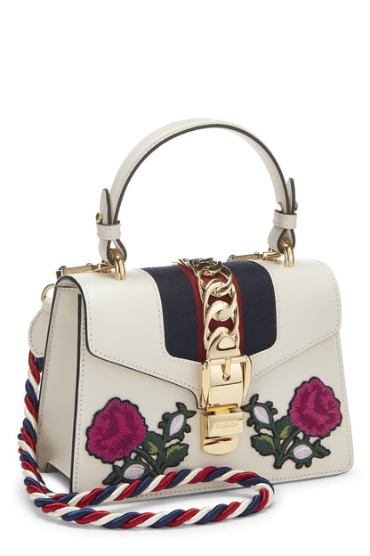 Gucci, Sylvie con tribanda de cuero bordada en blanco Pre-Loved, Blanco