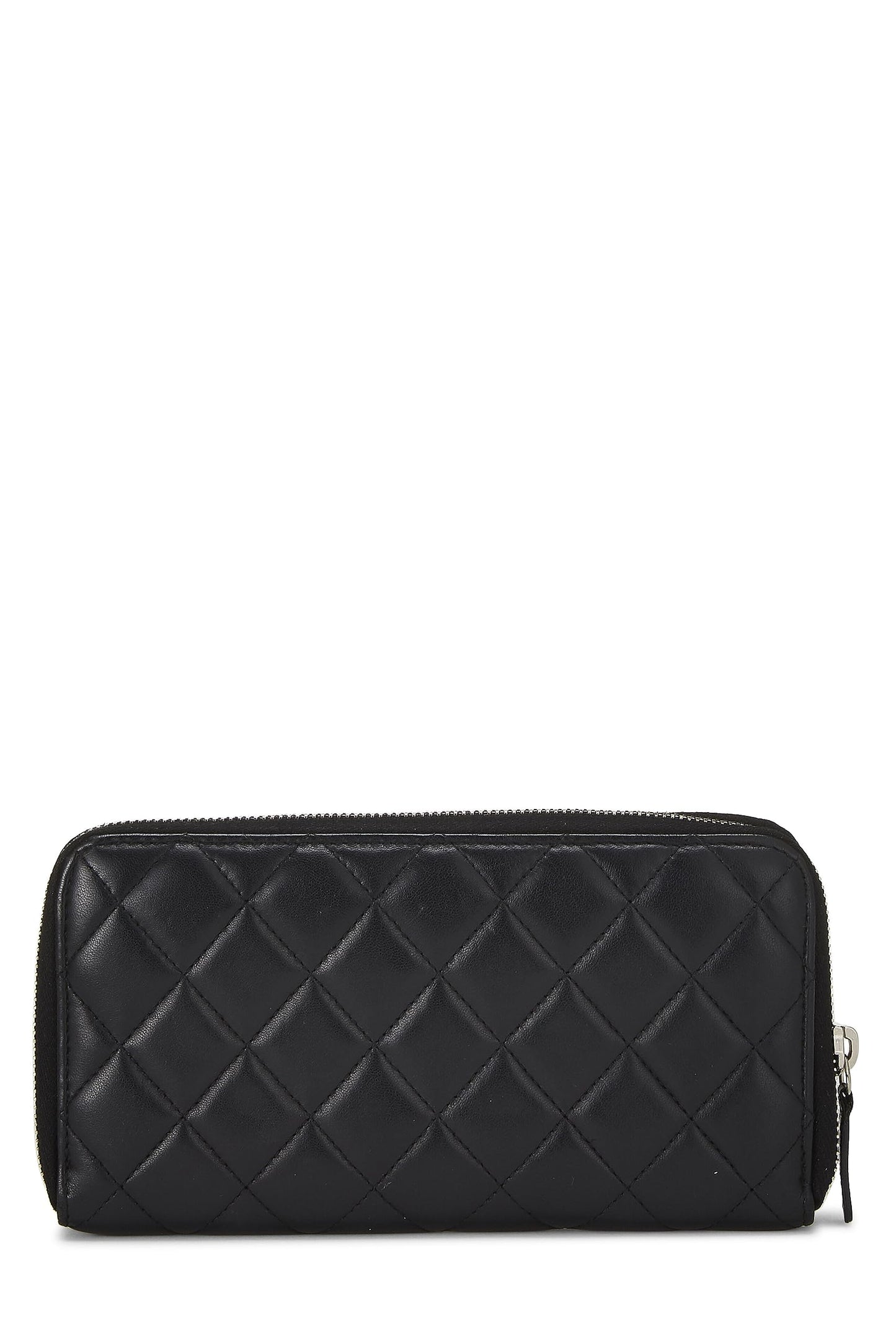 Chanel, portefeuille zippé en cuir d'agneau matelassé noir d'occasion, noir