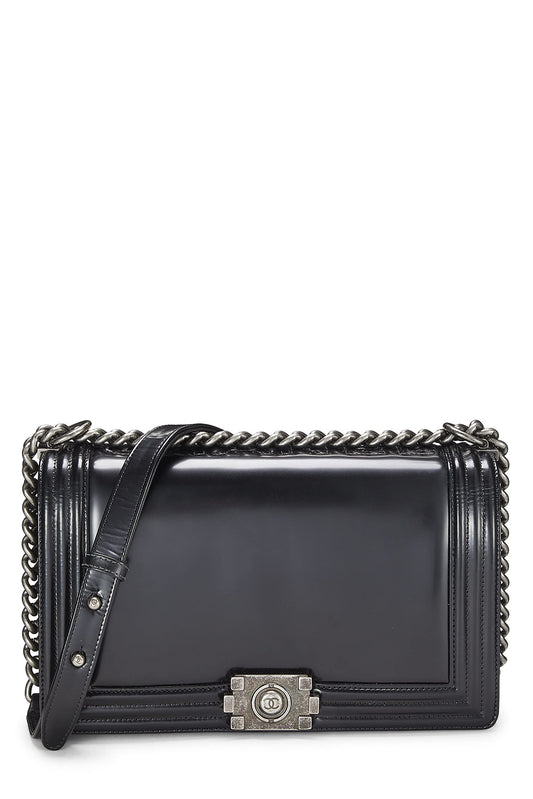 Chanel, sac à main Reverso Boy en cuir de veau noir, grand modèle, d'occasion