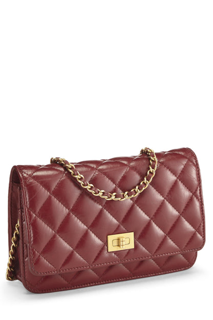 Chanel, Reedición de cartera con cadena (WOC) de piel de becerro acolchada roja Pre-Loved, Rojo