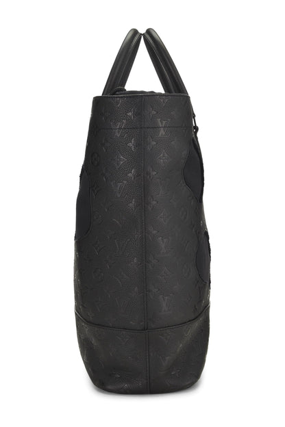 Louis Vuitton, Sac Empreinte monogramme noir avec trous COMME DES GARÇONS x Louis Vuitton pré-aimé, Noir