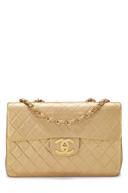 Chanel, Jumbo demi-rabat en cuir d'agneau matelassé doré d'occasion, doré