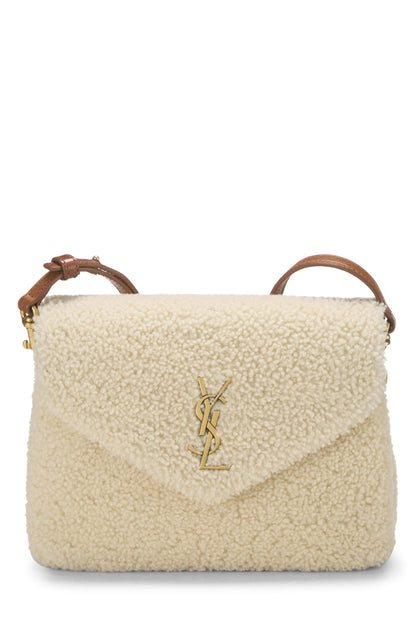 Yves Saint Laurent, Juguete Loulou de piel de oveja beige Pre-Loved, blanco