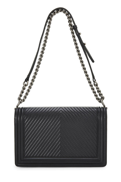 Chanel, Pre-Loved Black Chevron Calfskin Boy Bag Medium, Black