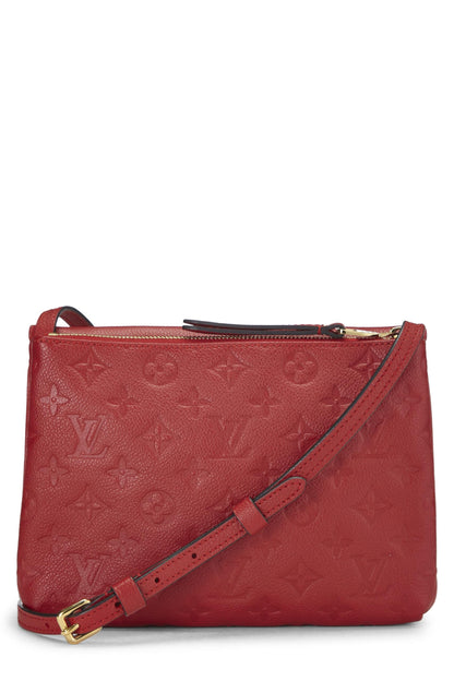 Louis Vuitton, Cherry Monogram Empreinte Twice d'occasion, rouge