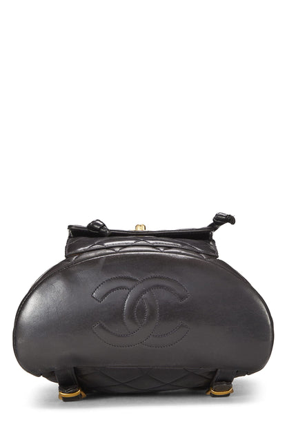 Chanel, sac à dos classique en cuir d'agneau matelassé noir de taille moyenne, d'occasion, noir