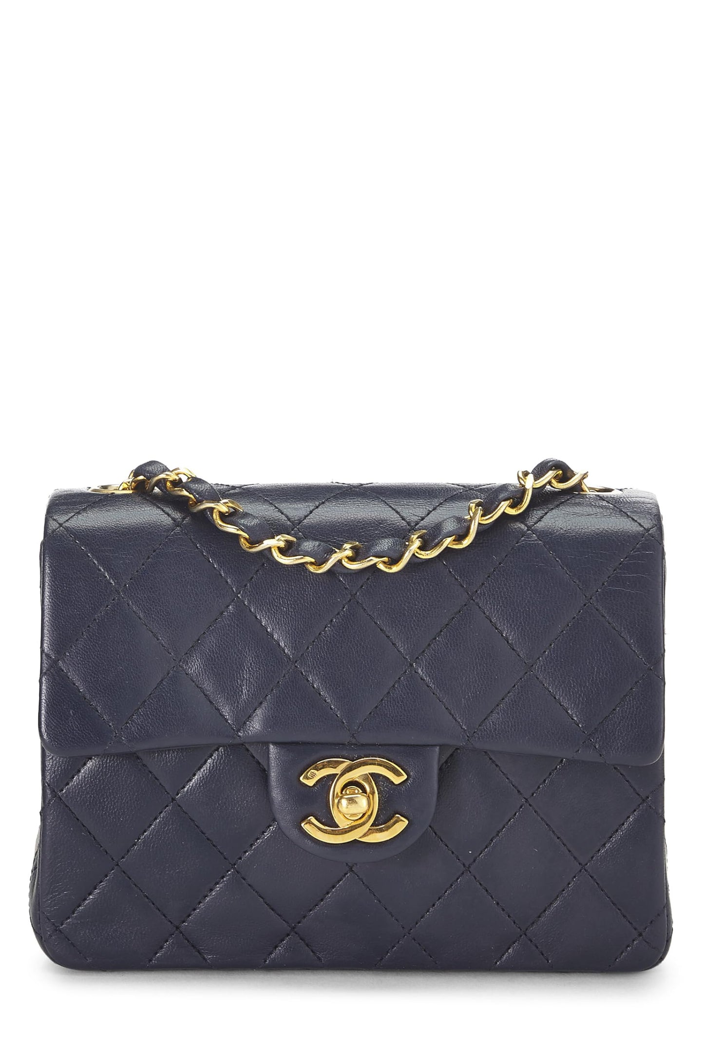 Chanel, Mini sac à rabat en cuir d'agneau matelassé bleu marine d'occasion, bleu marine